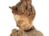 a statue of a woman holding a baby in her arms