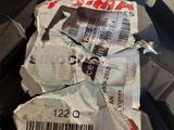 a piece of paper on the tire of a motorcycle