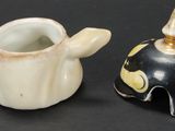 two vases that are sitting next to each other on a table