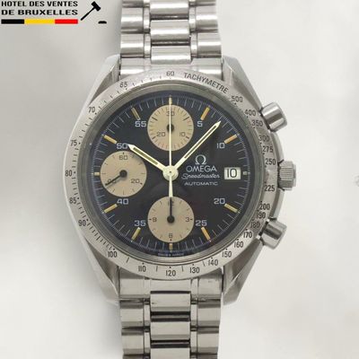 an image of a close up of a watch on a white surface