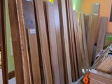 many pieces of wood on the floor in a room