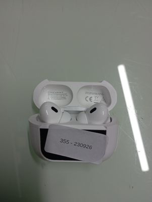 two airpods that are sitting in a box on the wall