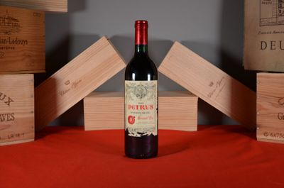 a bottle of wine that is sitting on a table
