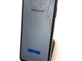 the screen of an iphone with a broken glass on it