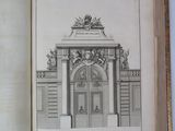 an open book with a drawing of a building on it