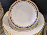 a lot of plates that are stacked on top of each other