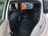 a car that has two seats in the back of it