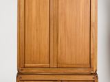 an image of a wooden cabinet with two drawers and a door
