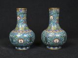 pair of chinese cloise enamel vases with floral designs