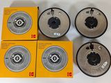 four different types of grinding discs on a white surface