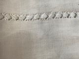 a close up of a piece of fabric with a stitching pattern