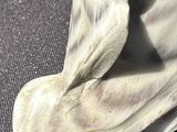 a figurine of a bird on a table