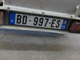 a close up of a license plate on a car