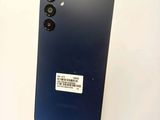 a close up of the back of a phone with a sticker on it