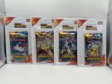 four packs of pokemon trading cards are lined up in a row