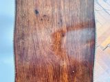an overhead view of a piece of wood on a parquet floor