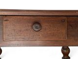 a small wooden box with a drawer on top of it