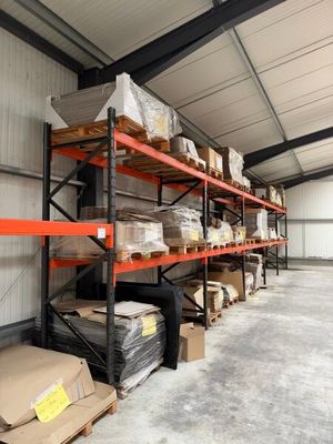 a large warehouse filled with lots of boxes and boxes