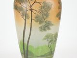 a vase with a painting of a tree on it