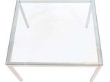 an image of a glass coffee table with a metal base