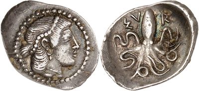 a silver coin with an octopus on the front and an octopus on the back