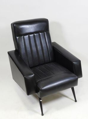 leather lounge chair with black upholstered seat and metal legs