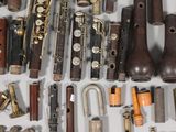 a lot of musical instruments that are sitting on a table