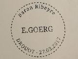a black and white photo of a stamp that says e gorg