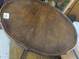 a wooden table with a wooden top on a wooden floor