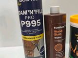 a can of wood stain and a can of wood stain next to a can of wood stain