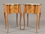 pair of french bedside tables with marble tops