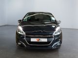 the front of a black car in a white room