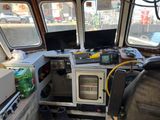 an image of a boat ' s cockpit with a lot of equipment on it