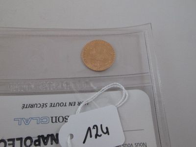 a gold coin with a price tag on it