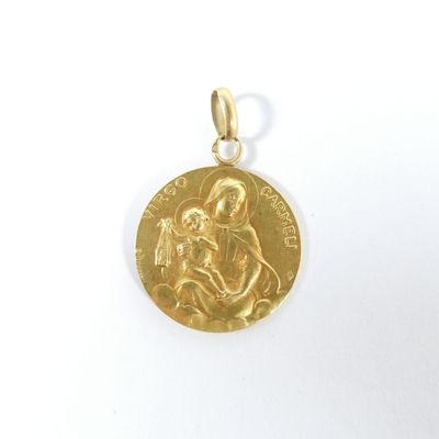 une image représentant une médaille d'or sur laquelle figurent une femme et un enfant