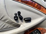 a close up of a remote control in a car