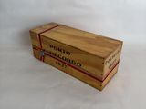 a small wooden box with a red ribbon on it