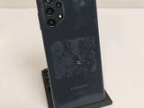 the back of a black samsung galaxy s20 with a camera attached to it