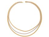 un collier en or et en argent orné de trois rangées de diamants