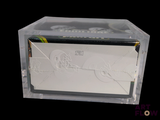 a picture of a clear box with a picture inside of it