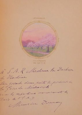 an old book with a picture of a tree in a field