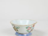 an image of a bowl with a bird and flowers design on it