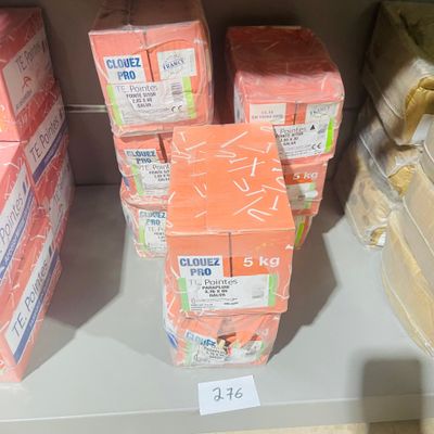 many boxes of orange soap on a shelf in a store