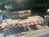 a truck with a fuel tank on the back of it