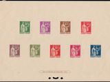 a group of different colored stamps on a piece of paper