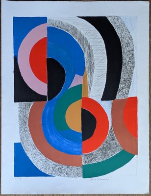 an abstract painting with different colors and shapes on a white paper