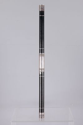 a black and silver pen sitting on top of a clear box