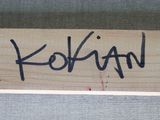 a picture of a wooden sign with the word kohlian written on it