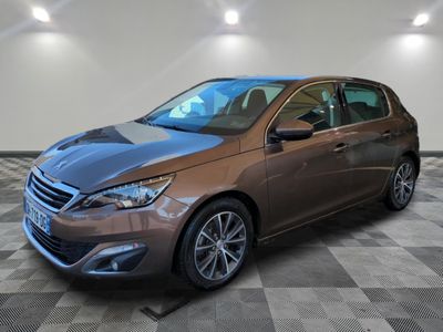 a brown car parked in a room with a checkered floor