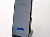 the back of a smartphone with the screen open on a stand